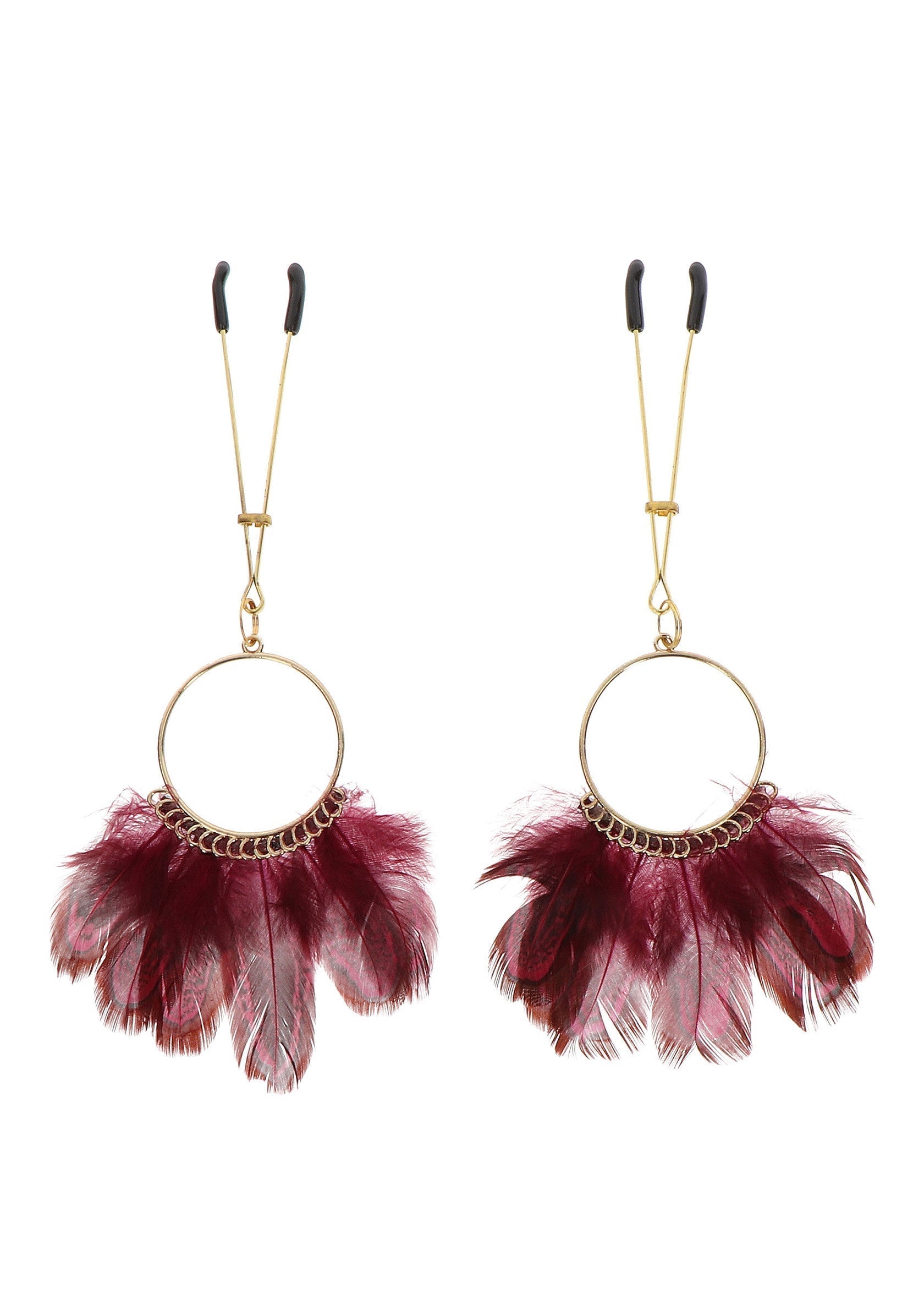 Tweezers with golden feathers